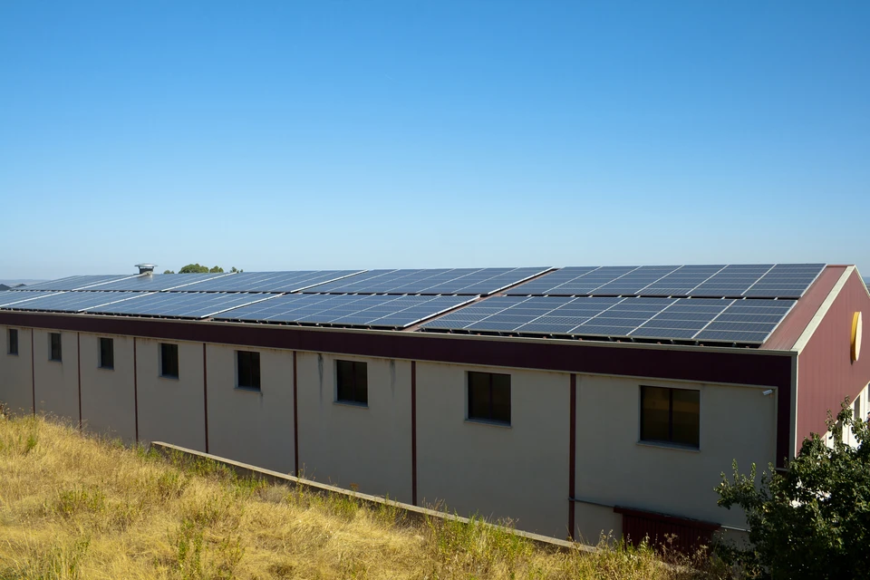 Solar panels on a warehouse roof,